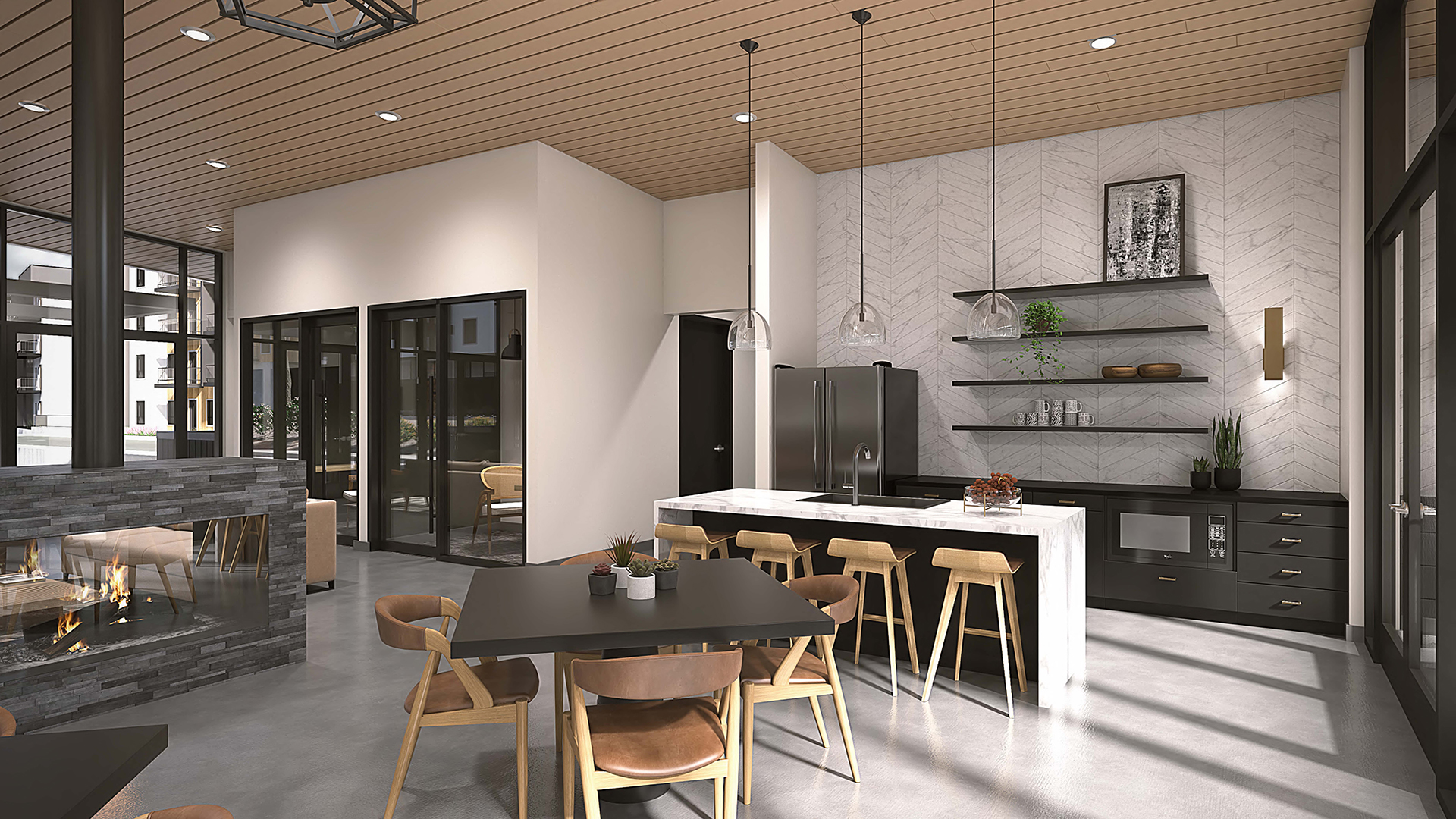 Rendering of community kitchen, with stainless steel appliances, ample seating, and fireplace.